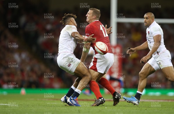 170819 - Wales v England - RWC Warm Up - Under Armour Summer Series - Anthony Watson of England receives a yellow card after this knock on whilst attempting to tackle Hadleigh Parkes of Wales