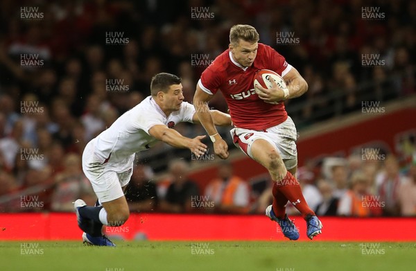 170819 - Wales v England - RWC Warm Up - Under Armour Summer Series - Dan Biggar of Wales gets past Ben Youngs of England