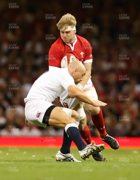 170819 - Wales v England, Under Armour Summer Series 2019 - Aaron Wainwright of Wales  takes on Willi Heinz of England