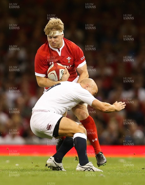 170819 - Wales v England, Under Armour Summer Series 2019 - Aaron Wainwright of Wales  takes on Willi Heinz of England