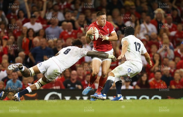 170819 - Wales v England, Under Armour Summer Series 2019 - Josh Adams of Wales takes on the English defence
