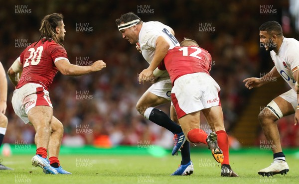 170819 - Wales v England, Under Armour Summer Series 2019 - Jamie George of England  is tackled by Hadleigh Parkes of Wales