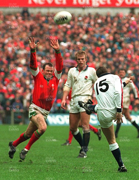 180295 - Wales v England - Five Nations - Ieuan Evans attempts to charge down Michael Catts kick