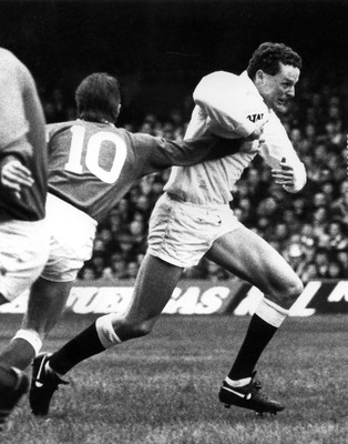 180389 - Wales v England - Five Nations - Jonathan Webb of England is tackled by Paul Turner of Wales