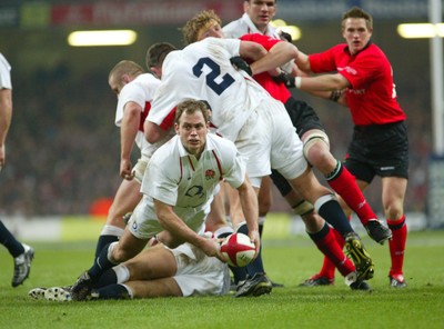 220203 - Wales v England - Six Nations Championship - England's Kyran Bracken feeds the ball out