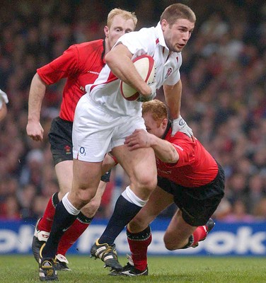 220203 - Wales v England - Six Nations Championship -  Ben Cohen tries to get through Martyn Williams