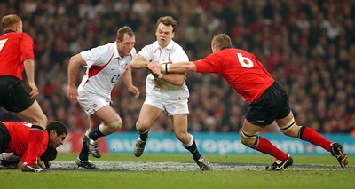 220203 - Wales v England - Six Nations Championship - England's Phil Christophers runs into Dafydd Jones