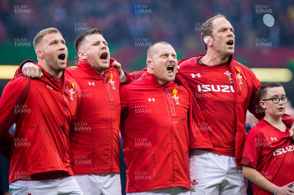 230219 - Wales v England, Guinness Six Nations  - Wales players sing the anthems ahead of the game