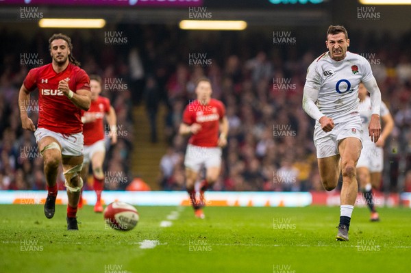 230219 - Wales v England, Guinnes Six Nations  - Josh Navidi of Wales and Jonny May of England chase for the ball