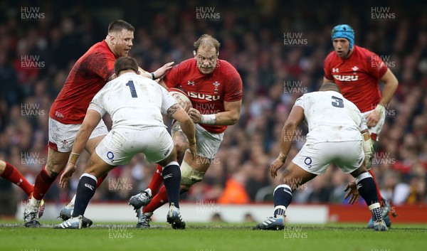 230219 - Wales v England - Guinness 6 Nations Championship - Alun Wyn Jones of Wales is challenged by Ben Moon and Kyle Sinckler of England