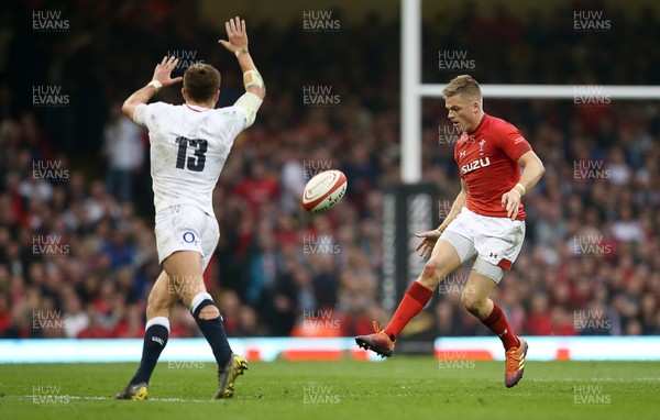 230219 - Wales v England - Guinness 6 Nations Championship - Gareth Anscombe of Wales kick is intercepted by Henry Slade of England
