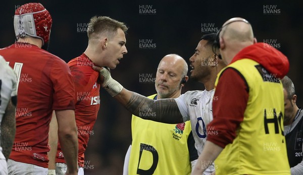 230219 - Wales v England - Guinness 6 Nations Championship - Manu Tuilagi of England grabs Liam Williams of Wales by the throat
