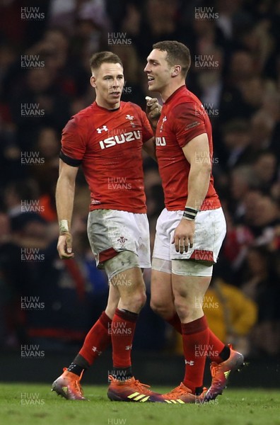 230219 - Wales v England - Guinness 6 Nations Championship - Liam Williams and George North of Wales  celebrate at full time