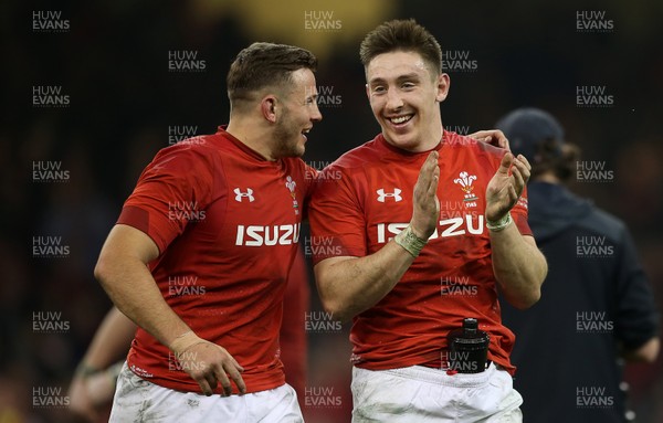 230219 - Wales v England - Guinness 6 Nations Championship - Elliot Dee and Josh Adams of Wales celebrate at full time