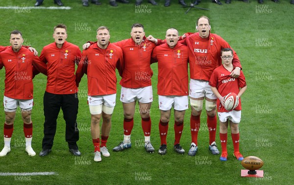 230219 - Wales v England - Guinness 6 Nations Championship - Jonathan Davies, Ross Moriarty, Rob Evans, Ken Owens and Alun Wyn Jones of Wales sing the anthem