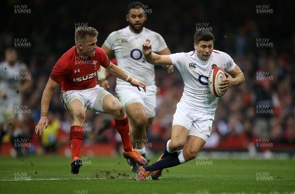 230219 - Wales v England - Guinness 6 Nations Championship - Ben Youngs of England is tackled by Gareth Anscombe of Wales