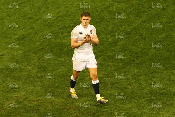 230219 - Wales v England -  Guinness 6 Nations -  A dejected Owen Farrell of England applauds the supporters after the final whistle