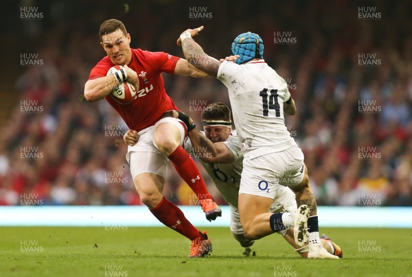 230219 - Wales v England, Guinness Six Nations - George North of Wales is tackled by Jack Nowell of England and Jamie George of England