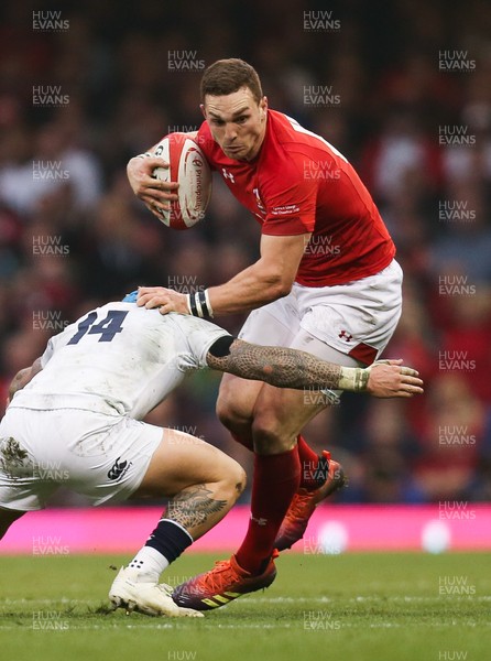 230219 - Wales v England, Guinness Six Nations - George North of Wales is tackled by Jack Nowell of England