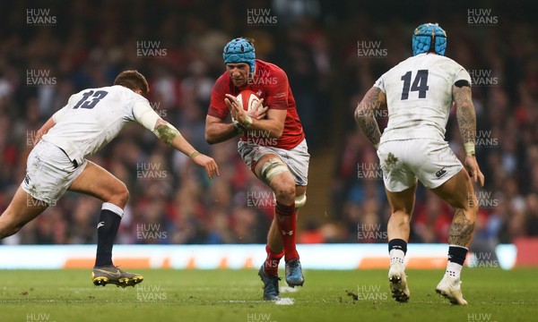 230219 - Wales v England, Guinness Six Nations - Justin Tipuric of Wales is tackled by Henry Slade of England and Jack Nowell of England