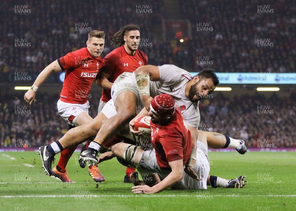 230219 - Wales v England, Guinness Six Nations - Cory Hill of Wales powers over to score try