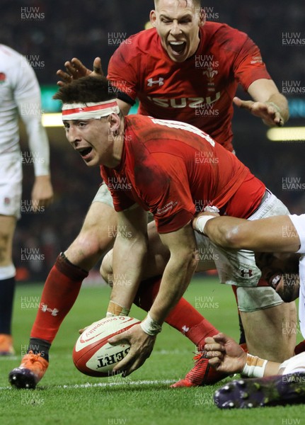 230219 - Wales v England, Guinness Six Nations Championship - Josh Adams of Wales  celebrates after scoring try with Liam Williams of Wales 