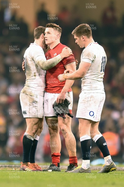 230219 - Wales v England - Guinness Six Nations - Elliot Daly of England Jonathan Davies of Wales and Owen Farrell of England 