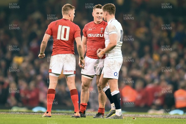 230219 - Wales v England - Guinness Six Nations - Gareth Anscombe of Wales Jonathan Davies of Wales  and Owen Farrell of England 