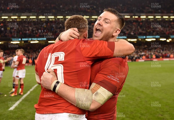 230219 - Wales v England - Guinness Six Nations - Elliot Dee and Rob Evans of Wales celebrate win at the end of the game