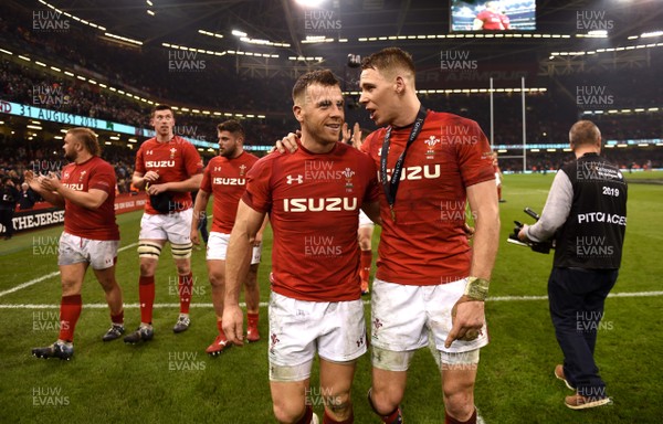 230219 - Wales v England - Guinness Six Nations - Gareth Davies and Liam Williams of Wales celebrate win at the end of the game