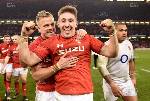230219 - Wales v England - Guinness Six Nations - Gareth Anscombe and Josh Adams of Wales celebrate win at the end of the game