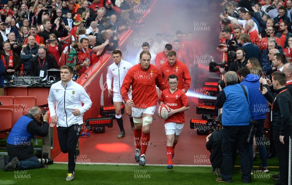 230219 - Wales v England - Guinness Six Nations - Owen Farrell of England and Alun Wyn Jones of Wales lead out their sides