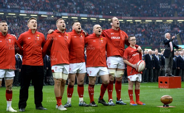 230219 - Wales v England - Guinness Six Nations - Wales players during anthems with mascot