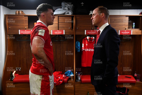 250223 - Wales v England - Guinness Six Nations 2023 - Mason Grady of Wales with HRH Prince William, The Prince of Wales in the Wales dressing room after the match