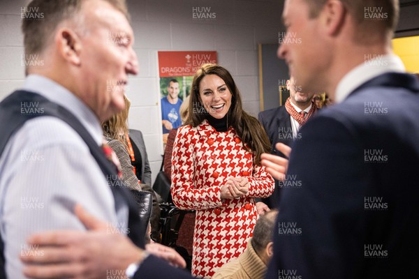 250223 - Wales v England - Guinness 6 Nations - Princess of Wales, Kate and Prince William speak to members of the Welsh Rugby Charitable Trust before the game