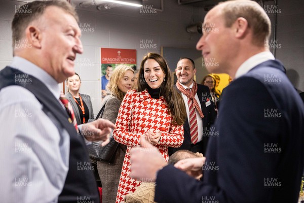 250223 - Wales v England - Guinness 6 Nations - Princess of Wales, Kate and Prince William speak to members of the Welsh Rugby Charitable Trust before the game