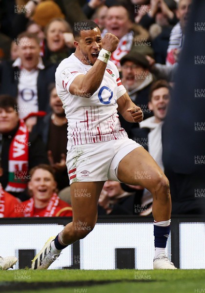 250223 - Wales v England - Guinness 6 Nations - Anthony Watson of England celebrates scoring a try
