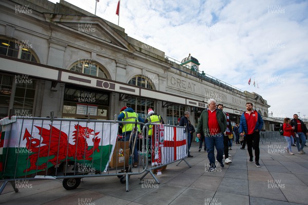 250223 - Wales v England - Guinness Six Nations - Supporters arrive at Cardiff Central railway station before the game