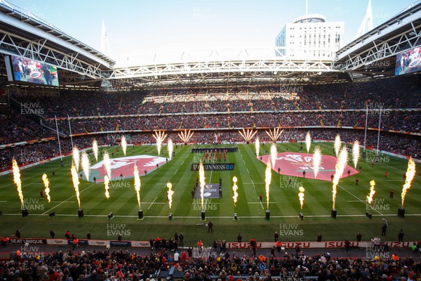 250223 - Wales v England - Guinness Six Nations - General view of Principality Stadium as pyrotechnics go off as the teams run out onto the field