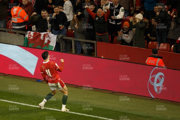250223 - Wales v England - Guinness Six Nations - Louis Rees-Zammit of Wales celebrates after scoring a try