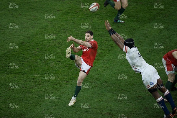 250223 - Wales v England - Guinness Six Nations - Tomos Williams of Wales kicks the ball