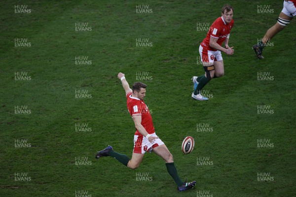 250223 - Wales v England - Guinness Six Nations - Dan Biggar of Wales kicks the ball