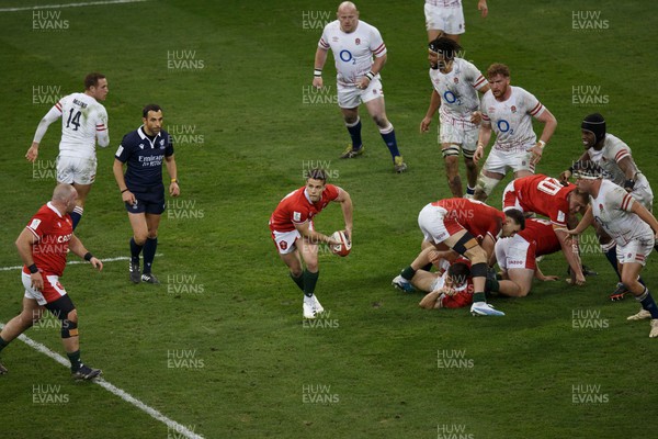 250223 - Wales v England - Guinness Six Nations - Kieran Hardy of Wales passes the ball