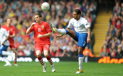 26.03.11 - Wales v England - Euro 2012 Qualifier - Glen Johnson of England is challenged by Andy King of Wales. 