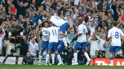 26.03.11 - Wales v England - Euro 2012 Qualifier - Frank Lampard of England celebrates his goal with his team-mates. 