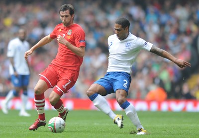 26.03.11 - Wales v England - Euro 2012 Qualifier - Joe Ledley of Wales and Glen Johnson of England compete. 