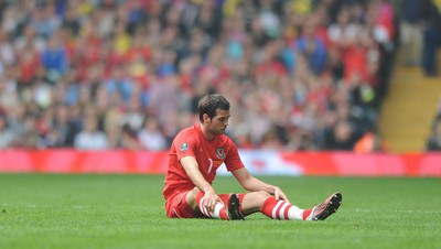 26.03.11 - Wales v England - Euro 2012 Qualifier - Joe Ledley of Wales looks dejected. 