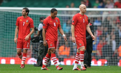 26.03.11 - Wales v England - Euro 2012 Qualifier - Joe Ledley, Ashley Williams and James Collins of Wales look dejected at the end of the game. 