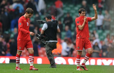 26.03.11 - Wales v England - Euro 2012 Qualifier - Aaron Ramsey and Joe Ledley of Wales look dejected at the end of the game. 
