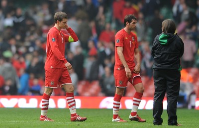 26.03.11 - Wales v England - Euro 2012 Qualifier - Aaron Ramsey and Joe Ledley of Wales look dejected at the end of the game. 